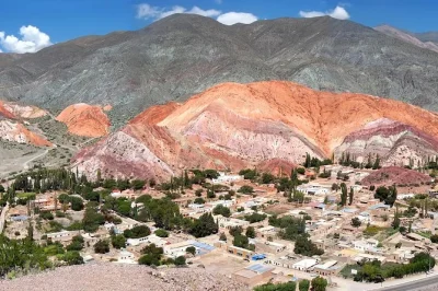 Walk through purmamarca’s craft market, see the seven colors hill, and explore ancient ruins in tilcara with a local guide. includes hotel pickup.