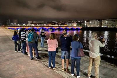Follow the lérez river at night on a small group walking tour of pontevedra’s illuminated bridges, medieval walls, and riverside legends. includes local guide.