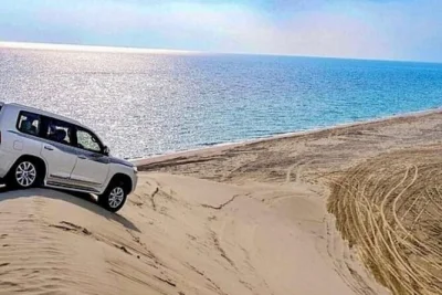 Feel the rush of dune bashing in qatar’s desert, visit the inland sea where sand meets ocean, and try a camel ride. includes pickup and local guide.