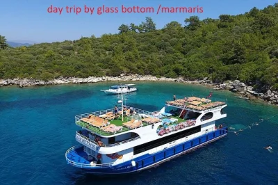 See marmaris castle, swim in quiet bays, and watch sea life from a glass-bottom boat. includes lunch, sunbeds, and local guide. book your spot now.