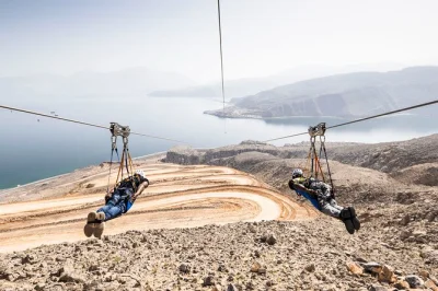 Fly the musandam zipline from jebel fitt to atana khasab hotel, with a local guide and all safety gear. includes air-conditioned transfer. book now.