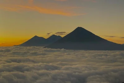 Climb pacaya volcano from guatemala city, roast marshmallows on lava, taste volcanic pizza, and explore the historic center with a private guide. includes lunch & transport.