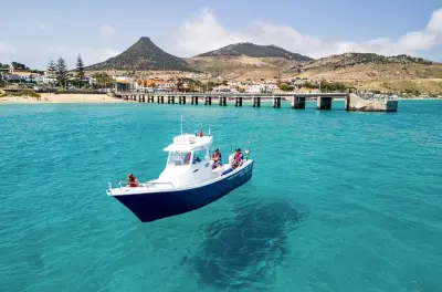 Tour privado de barco em Porto Santo: Circuito completo pela costa