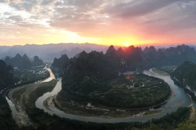 Wake up your senses with a private damian hill climb in yangshuo, panoramic li river sunrise, hotel pickup, and lunch on west street—all with a local guide.
