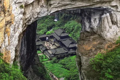 Experience chongqing’s wulong karst with a local guide. walk the three natural bridges, visit ancient sites, and enjoy lunch. includes hotel pickup.
