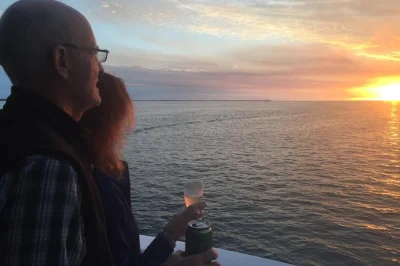 Experience a hervey bay sunset cruise between k'gari & the mainland, with fresh seafood, a welcome drink, and hotel pickup included. book your spot now.