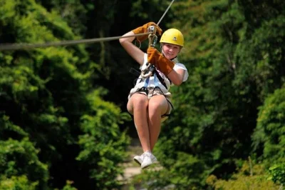 Fly across punta cana’s forest on 12 ziplines with a local guide. includes hotel pickup, all safety gear, and water. book your spot for this adventure.