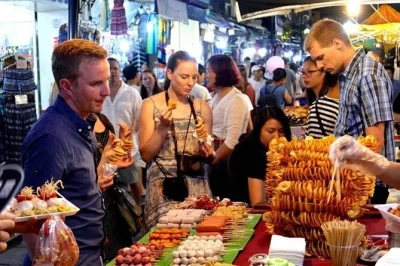 Evening hoi an street food tour with night market, small group, local guide, river boat ride, and hidden eats. explore hoi an ancient town after dark.