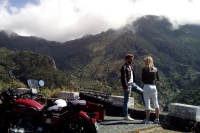 Ride a vintage sidecar along madeira’s west coast with a local guide. visit cabo girão, câmara de lobos, and calheta. includes pickup and helmets.