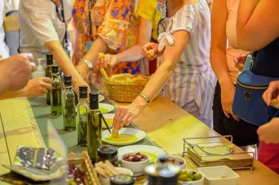 Private olive oil tour from katakolo port. visit a working olive farm, taste fresh oils, and enjoy local lunch in korakochori village. book your spot now!