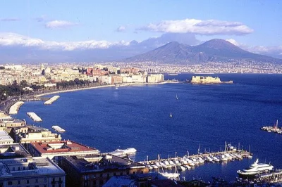Ride through naples by scooter with a neapolitan guide, visiting the royal palace, posillipo, virgiliano park, and borgo marinari. includes private tour.