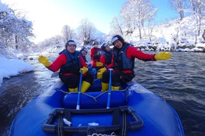 Raft through niseko’s snowy landscape on the shiribetsu river with a local guide. includes private transport, hot tea, snacks, and all rafting gear.