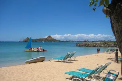 Relax on reduit beach with round-trip shuttle from st lucia cruise port. includes pickup, local drink, and flexible return times. book your beach break now.